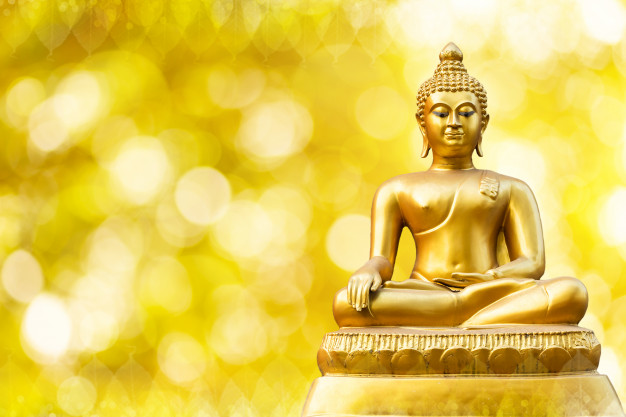 beautiful-golden-buddha-statue-golden-yellow-bokeh_29332-1580.jpg